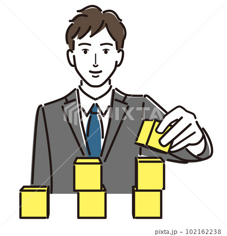 積み木を重ねるビジネスマン 積み木を重ねるビジネスマン 102162238