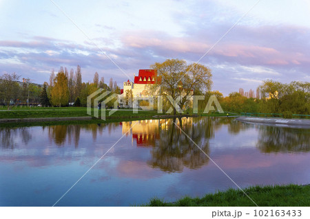Belarus, Minsk May 7, 2022 Church of the Light of the Gospel, a beautiful reflection in the water Belarus, Minsk May 7, 2022 Church of the Light of the Gospel, a beautiful reflection in the water 102163433