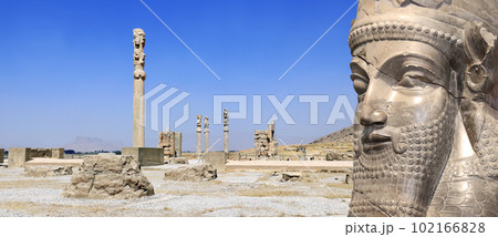 Horizontal banner with columns of Apadana Palace built by Darius the Great and face of assyrian protective deity lamassu - human-headed winged bull, Persepolis, Iran Horizontal banner with columns of Apadana Palace built by Darius the Great and face of assyrian protective deity lamassu - human-headed winged bull, Persepolis, Iran 102166828