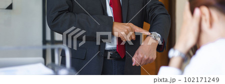 Business analysis concept, Senior business pointing on wrist watch and reprimand when late meeting Business analysis concept, Senior business pointing on wrist watch and reprimand when late meeting 102171249