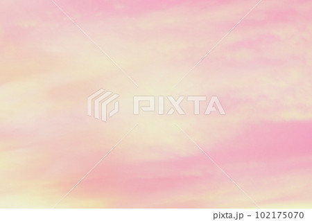 Sky with soft and fluffy pastel orange pink and...の写真素材