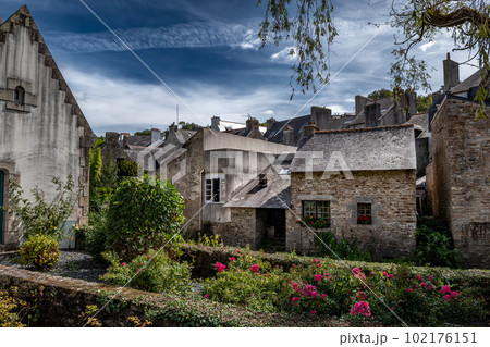 Ancient Buildings In Medieval Village And Artist Enclave Pont Aven At Finistere River Aven In Brittany, France 102176151