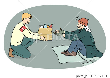 Caring volunteer give food box to homeless person 102177131