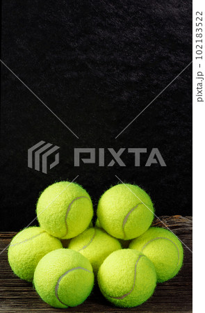 Tennis balls on wooden background, sport concept, rustic style, stock photo, space for text Tennis balls on wooden background, sport concept, rustic style, stock photo, space for text 102183522