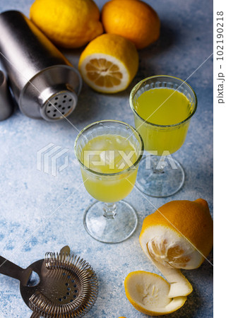 Traditional italian limoncello or lemon liquor 102190218