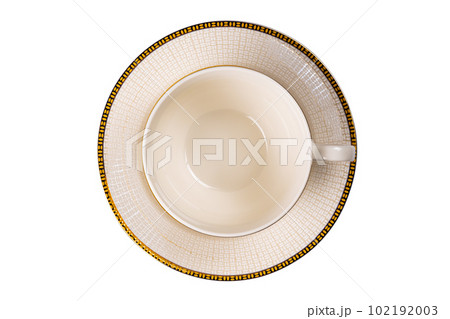 Beautiful empty ceramic coffee cup with saucer isolated on white background. 102192003