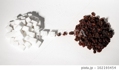 Substituting refined sugar for healthy natural sweet food, raisins Substituting refined sugar for healthy natural sweet food, raisins 102193454