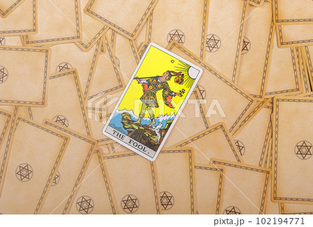 Lodz Poland April 15 2023 Fool, major arcana on tarot cards deck background. Taro divination concept 102194771