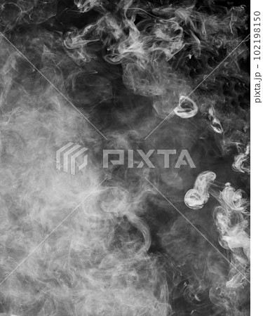 Puffs of smoke on a black background 102198150