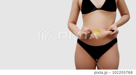 The belly of overweight people with junk food 102203768