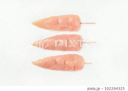 Raw Chicken breast Fillets.Chicken fillet inner skewers.Food concept.Top view.Skewers from raw chicken meat inner fillet for supermarket,white background.Food for retail.Ogranic food,healthy eating. Raw Chicken breast Fillets.Chicken fillet inner skewers.Food concept.Top view.Skewers from raw chicken meat inner fillet for supermarket,white background.Food for retail.Ogranic food,healthy eating. 102204325