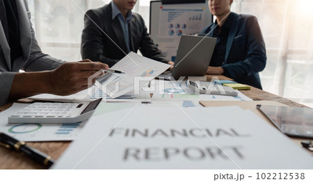 Business team working startup growth of the company and discussion analyzing for financial strategy statistics with computer, documents graph data results of collaboration their successful teamwork 102212538