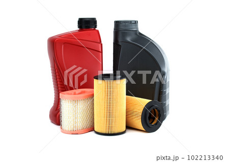 Motor oil containers and filters over white background 102213340