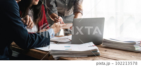 Business people meeting and working with financial report, talking about business plan for investment, finance analysis concept 102213578