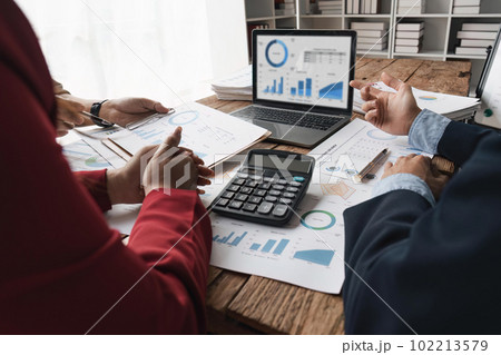 Business people adviser meeting to analyze and discussion on the financial report in the meeting room. Investment Consultant, Financial advisor and accounting concept 102213579
