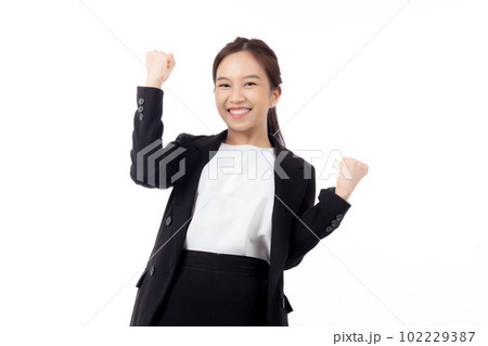 Portrait beautiful businesswoman in suit standing with glad and success isolated on white background 102229387