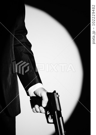 Pistol gun dark at night 102229482