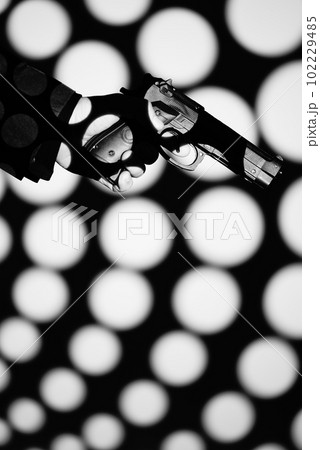 Pistol gun dark at night 102229485