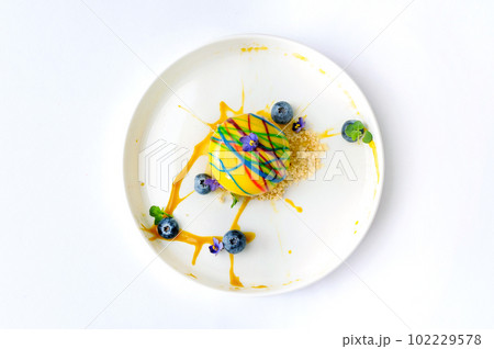 Creative dessert with berries from the chef 102229578
