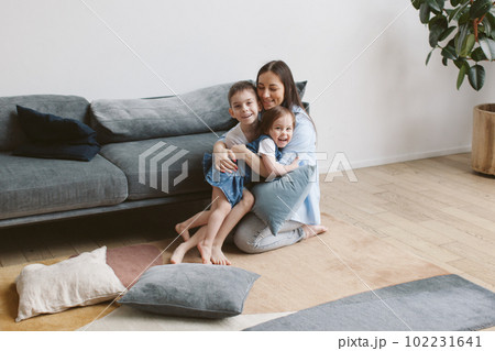 Family time. Children play with their mother. Family time. Children play with their mother. 102231641