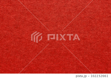 Red textured blank paper background close up. Vintage grainy background for design Red textured blank paper background close up. Vintage grainy background for design 102232661