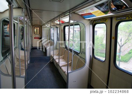 DETROIT, MICHIGAN, UNITED STATES - MAY 22nd, 2018: Inside the Detroit People Mover public transit system with an empty cabin. The elevated monorail is one of many public modes of transportation in the DETROIT, MICHIGAN, UNITED STATES - MAY 22nd, 2018: Inside the Detroit People Mover public transit system with an empty cabin. The elevated monorail is one of many public modes of transportation in the 102234868