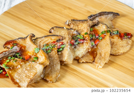 Battered eryngii mushrooms Battered eryngii mushrooms 102235654