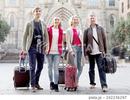 tourists with suitcases and camera walk in Barcelona tourists with suitcases and camera walk in Barcelona 102236297