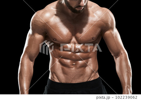 Muscular bodybuilder guy doing posing Muscular bodybuilder guy doing posing 102239062