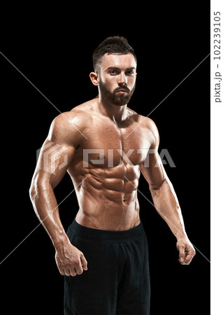 Muscular bodybuilder guy doing posing 102239105