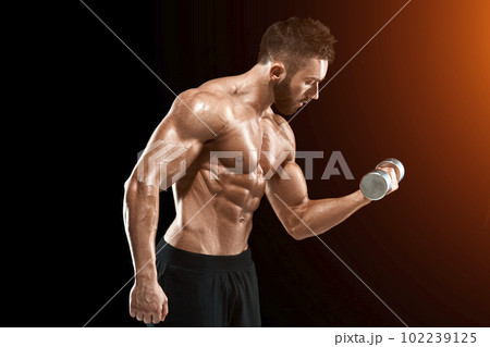 Muscular bodybuilder guy doing posing 102239125