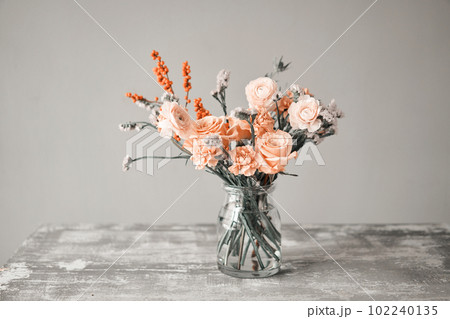 Finished flower arrangement in a vase for home. Flowers bunch, set for interior. Fresh cut flowers for decoration home. European floral shop. Delivery fresh cut flower. 102240135