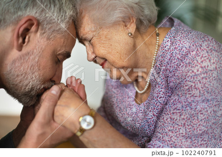 Portrait of mature man and his senior mother. Portrait of mature man and his senior mother. 102240791