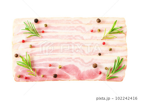 Slices smoked bacon and rosemary isolated on white background, top view. 102242416