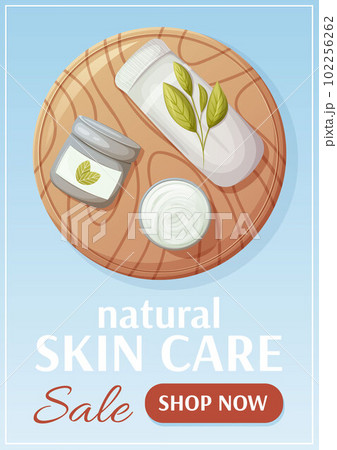 Skin care sale poster. Round wooden board with rolled up towel and face cream. Top view.  102256262