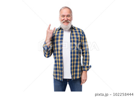 senor gray-haired retired man with a mustache and beard pointing to the side with his index finger senor gray-haired retired man with a mustache and beard pointing to the side with his index finger 102258444
