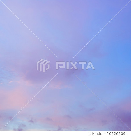 Twilight sky with effect of light in pastel pink, coral, orange, blue tones. Colorful sunset of soft clouds. Background. square Twilight sky with effect of light in pastel pink, coral, orange, blue tones. Colorful sunset of soft clouds. Background. square 102262094
