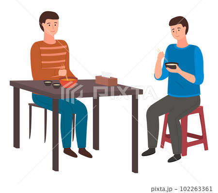 Young men eating rice with chopsticks. Asian restaurant visitors dines national japanese food 102263361