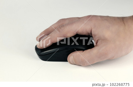 Male hand on computer mouse, close-up on white background 102268775
