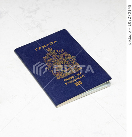 Canadian Passports on a white marble background Canadian Passports on a white marble background 102270148
