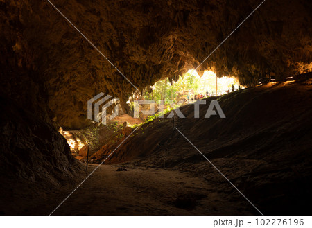 View of the entrance chamber of Tham Luang cave looking from inside of the cave. View of the entrance chamber of Tham Luang cave looking from inside of the cave. 102276196