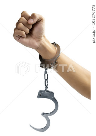 Arrested man with a handcuff on his hand Arrested man with a handcuff on his hand 102276778