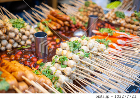 grilled meatball and sausage with spicy sauce grilled meatball and sausage with spicy sauce 102277723