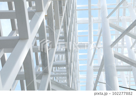 White Steel beam construction with blue sky background White Steel beam construction with blue sky background 102277882