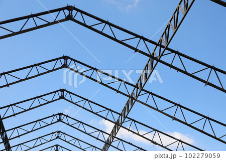 Steel structure with blue sky background Steel structure with blue sky background 102279059