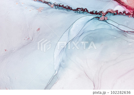 Marble stone glowing golden veins. High resolution. Abstract fluid art painting in alcohol ink technique, mixture blue, red and gold paints.  102282636