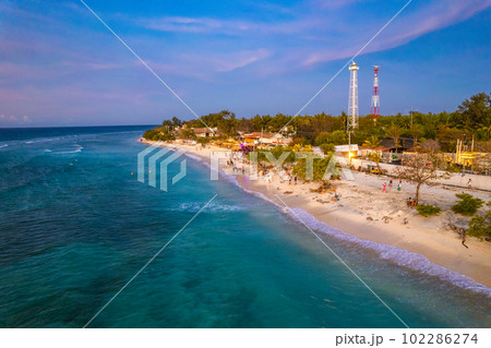 Aerial view of Gili Trawangan beach during sunset in Lombok, Indonesia Aerial view of Gili Trawangan beach during sunset in Lombok, Indonesia 102286274