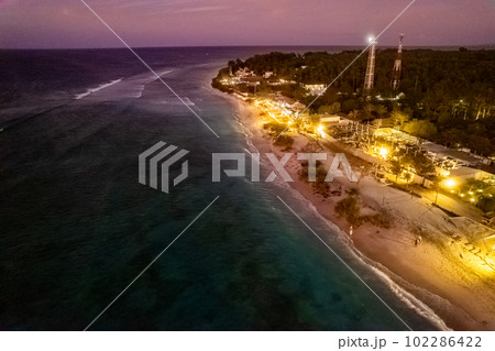 Aerial view of Gili Trawangan beach during sunset in Lombok, Indonesia Aerial view of Gili Trawangan beach during sunset in Lombok, Indonesia 102286422