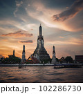 Wat Arun at sunset with long tail boat, in Bangkok, Thailand. Generative AI 102286730