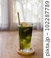 Green tea with coconut juice in coffee shop cafe 102287789